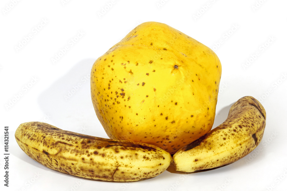 Yellow Paw Paw with Two Ripe Speckled Bananas