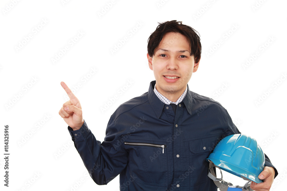 指示する笑顔の労働者 指示する笑顔の労働者