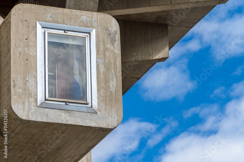 Detail of a Brutalist building with a window photo