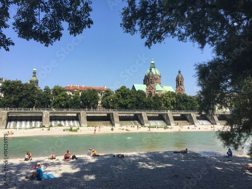 Isarufer in München im Sommer, Bayern photo