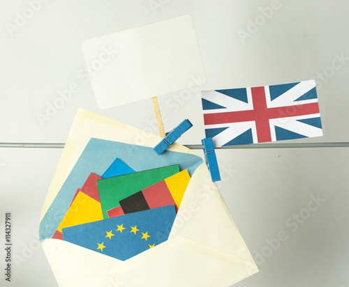 Flags of European Union (flags of different countries eurozone) and United Kingdom, Brexit UK EU referendum concept. place card for text photo