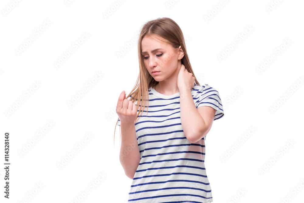 Young sick or cold woman holding a pill before eat, isolated on white Young sick or cold woman holding a pill before eat, isolated on white