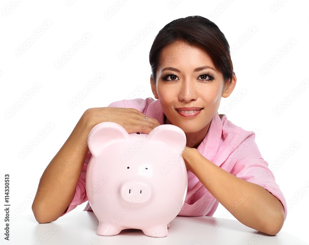 Young asian woman with a piggy bank. Young asian woman with a piggy bank.