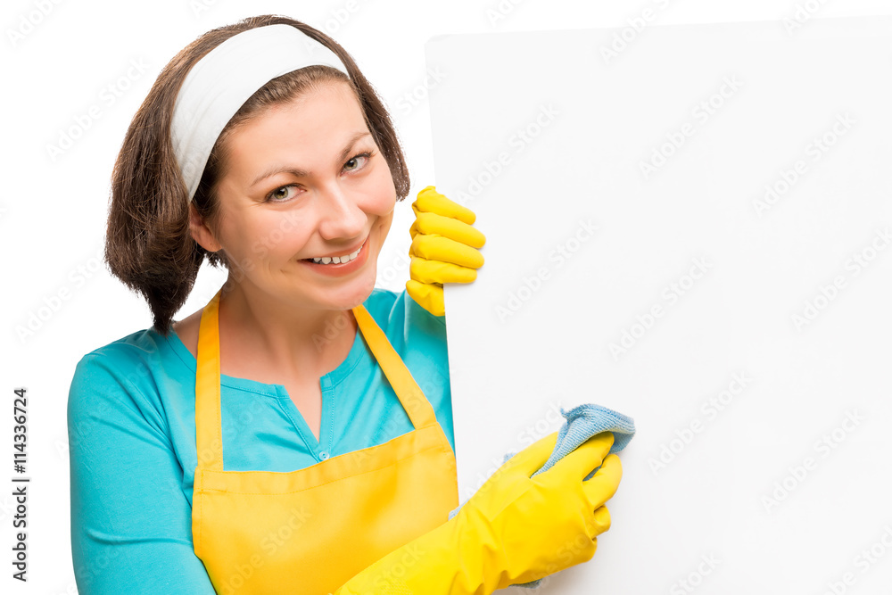 beautiful housewife holding a rag and a poster for the inscripti beautiful housewife holding a rag and a poster for the inscripti