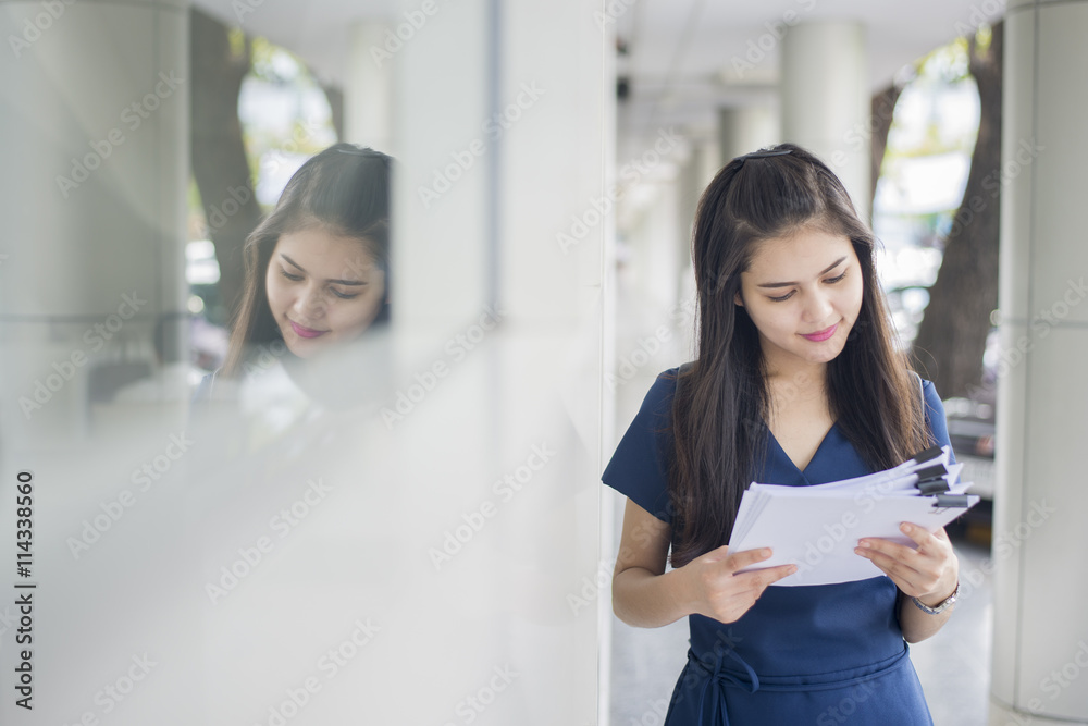 A portrait of an Asian university student on campus A portrait of an Asian university student on campus