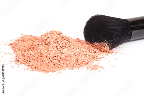 Powder blush and black makeup brush photo