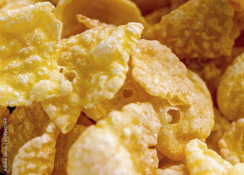 texture of corn flakes, muesli for breakfast close-up, shallow d texture of corn flakes, muesli for breakfast close-up, shallow d