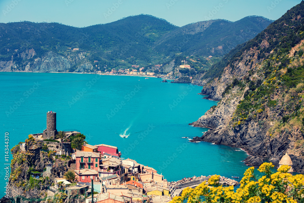 Rocky sea coast. Ligurian sea, view at Vernazza Village, Cinqe Terre, Italy