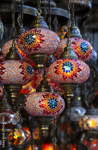 traditional Asian lanterns of colored glass on the market © lester120