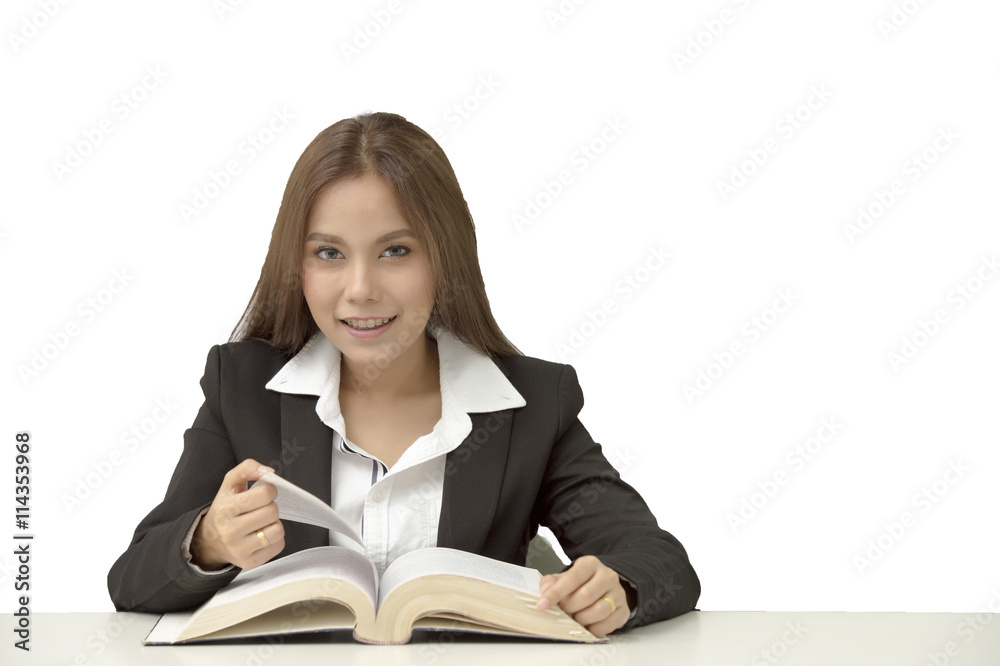 Portrait of happy student or bussiness women sitting in library before textbook and looking at camera on white isolated Portrait of happy student or bussiness women sitting in library before textbook and looking at camera on white isolated