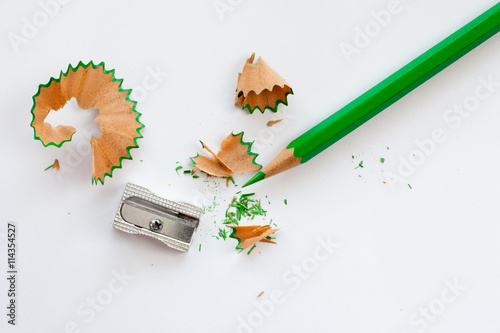 sharpener and green wooden pencil photo