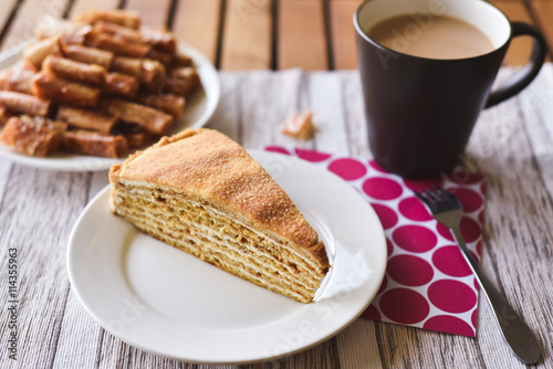 A cut of a Russian homemade Honey Cake 