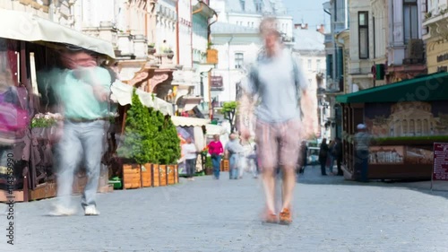 

4K .Silhouettes of people on  summer city street.  Accelerate shoot

 photo