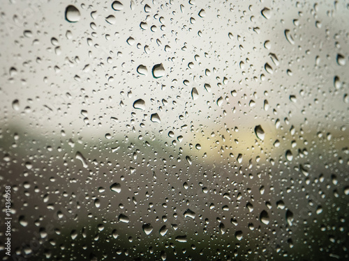Selective focus, Raindrops on glass with city (raindrops,blur, rain)