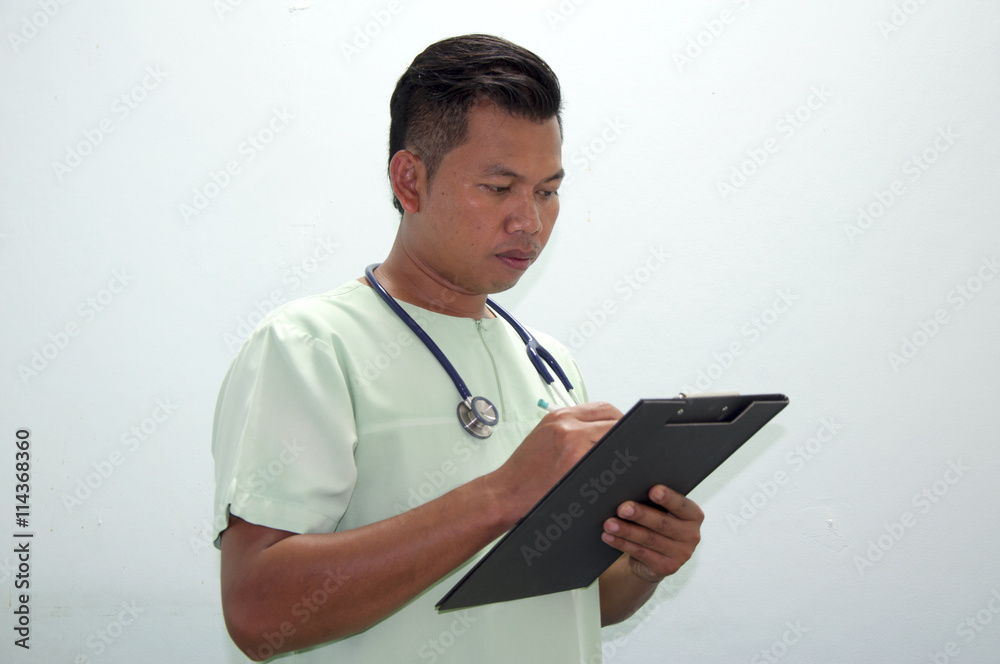 Doctor writing a medical prescription Doctor writing a medical prescription