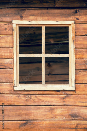 Window and wooden wall