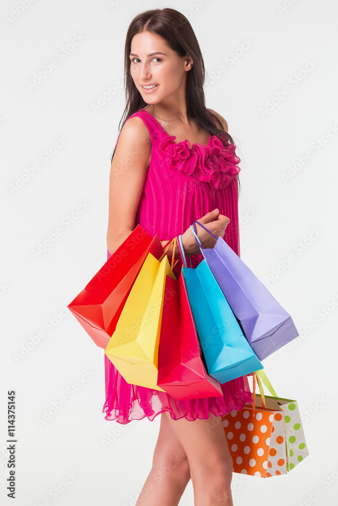 Beautiful woman with a lot of shopping bags Beautiful woman with a lot of shopping bags