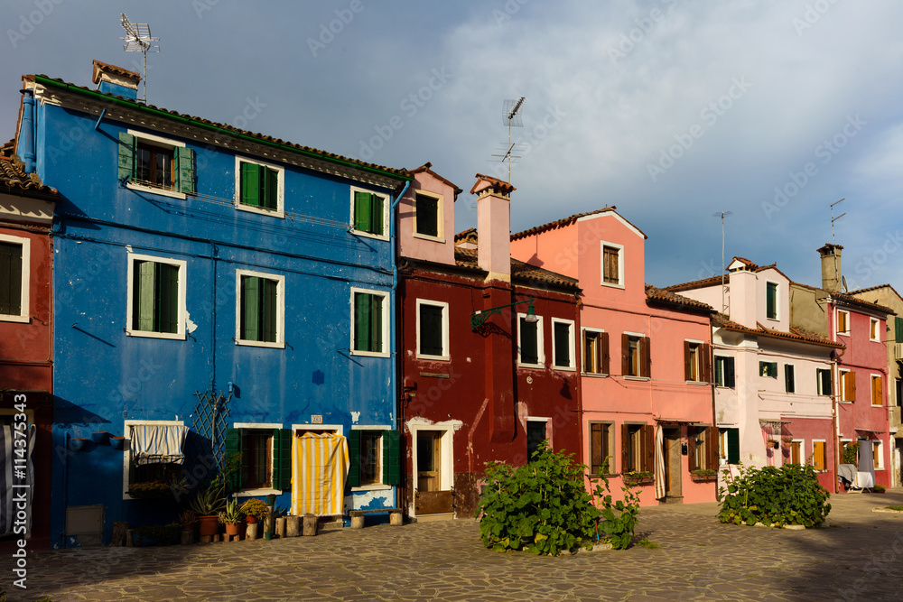 The Venetian island of Burano may well be the most colorful town in the world, with no two houses next to each other painted the same color.