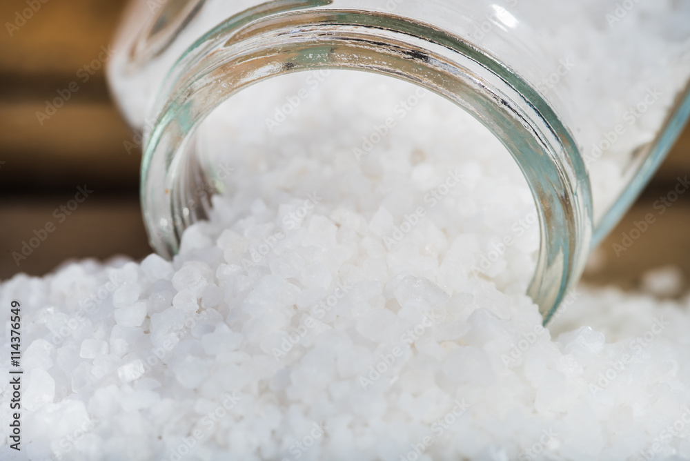 Sea salt on a wooden background. Sea salt on a wooden background.