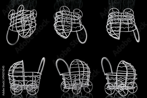 Bilde på lerret metal artifact stroller on a black background