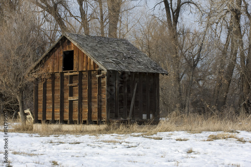 old, small abandoned barn