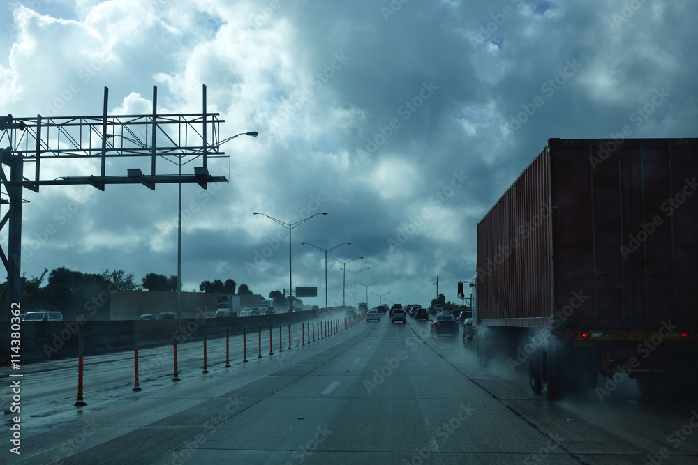 Miami Florida rainy driving road with trucks
