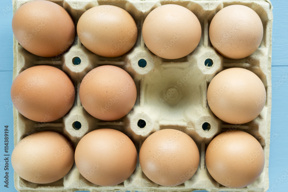 Chicken eggs in an egg cup Chicken eggs in an egg cup