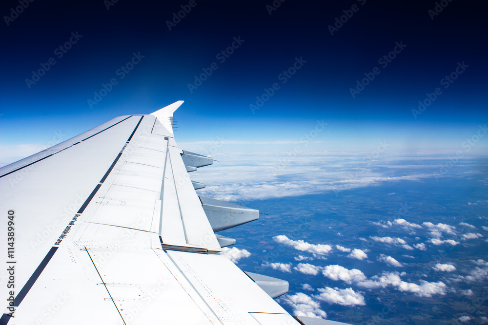 Fototapeta premium Fly above the clouds
