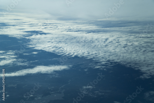 Clouds view from a plane window early morning