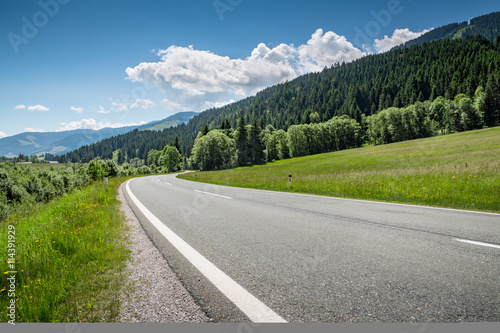 Empty country road in summer