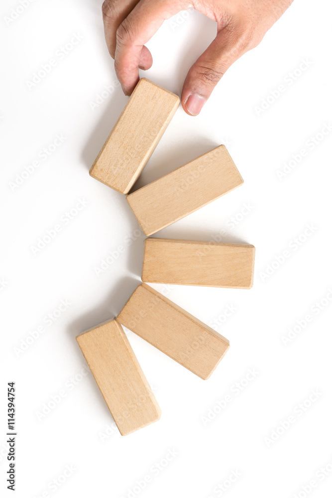 Hand aranging wood block stacking as step stair. Hand aranging wood block stacking as step stair.