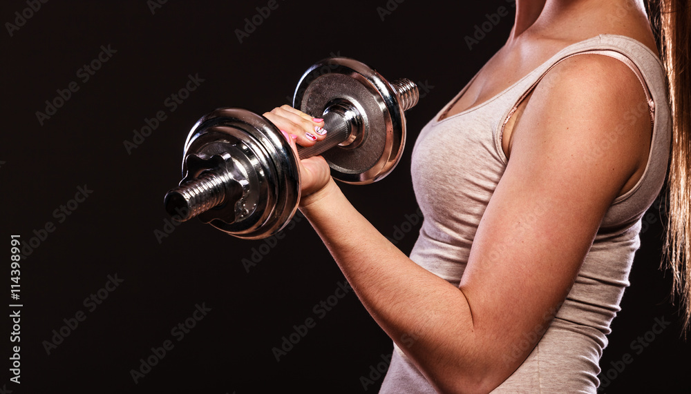 athletic woman working with heavy dumbbells athletic woman working with heavy dumbbells