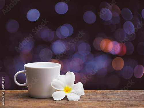 coffee and white plumeria flowers