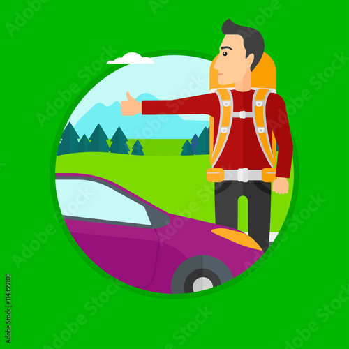 Young man hitchhiking.