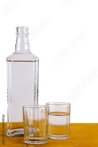 Bottle of Russian vodka and glasses