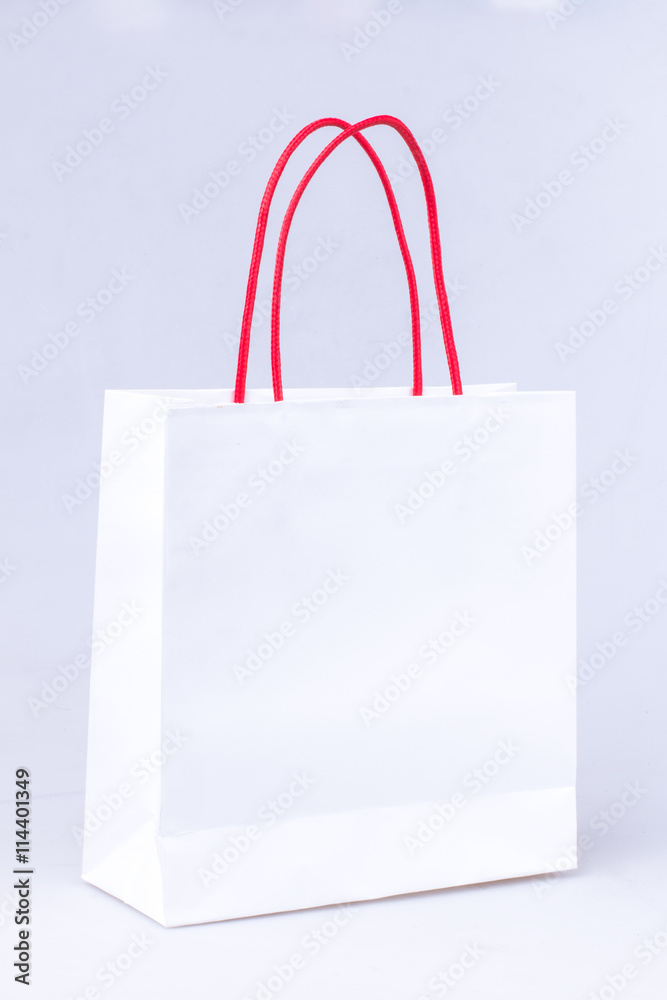 elegant white paper shopping bag with red handle elegant white paper shopping bag with red handle