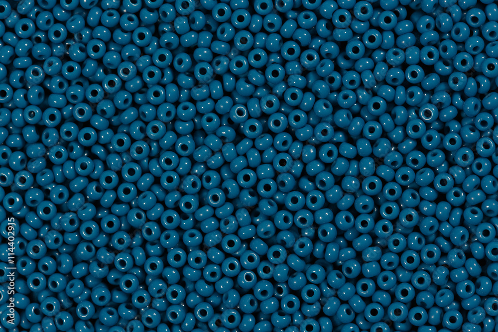Beads of dark blue colour close-up. Beads of dark blue colour close-up.