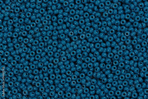 Beads of dark blue colour close-up.