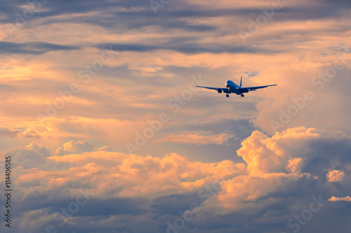 Commercial passenger airplane coming in for landing during beaut