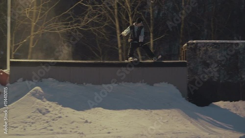 Extreme skier to slide on the rails photo