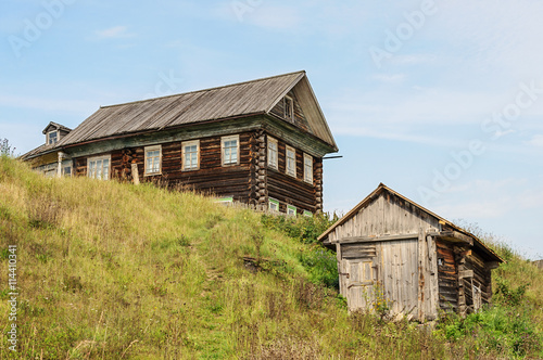 Large wooden house on the hill in the country