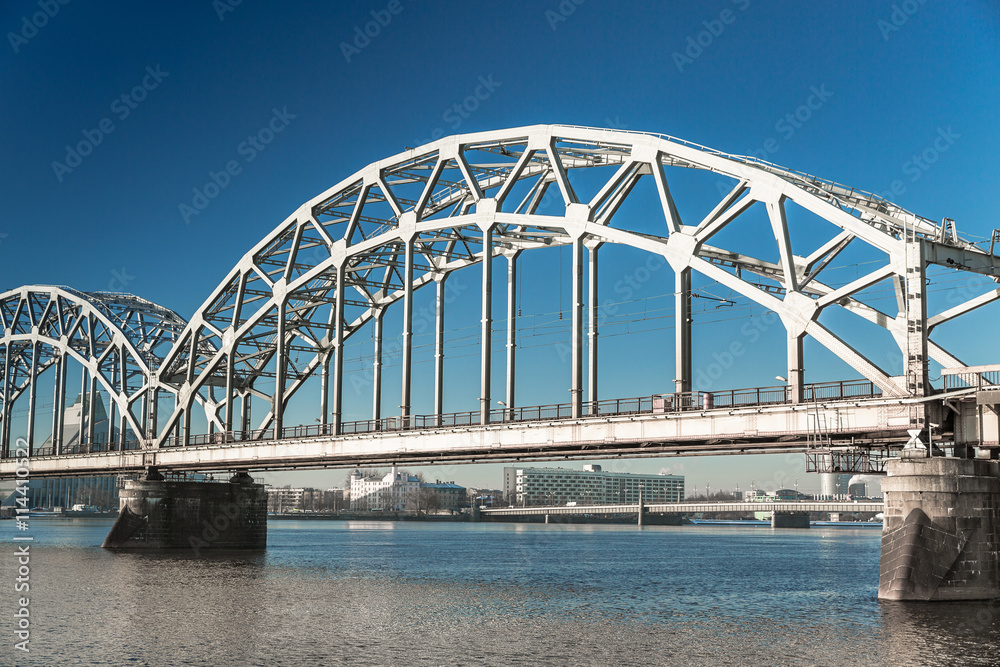 A view of the Railway Bridge over Daugava River in Riga, Latvia A view of the Railway Bridge over Daugava River in Riga, Latvia