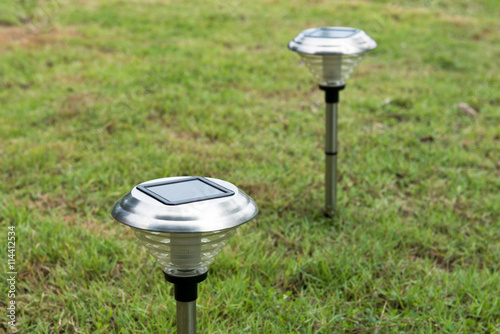 Solar Light in the grass. Clean energy is popular. For Earth, Superfund photo