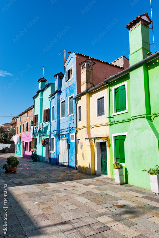 Row of bright colorful houses in Burano, Venice