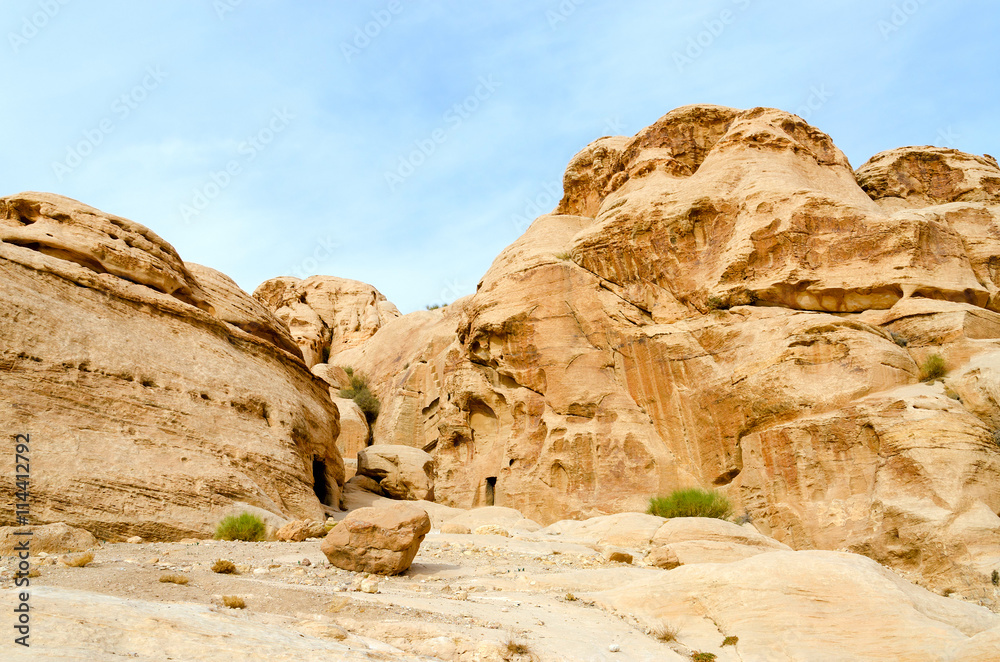 Jordan, Petra, rock on road in gorge