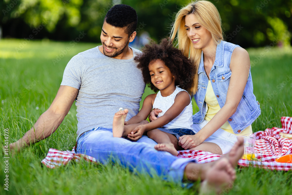 Family picnicking outdoors