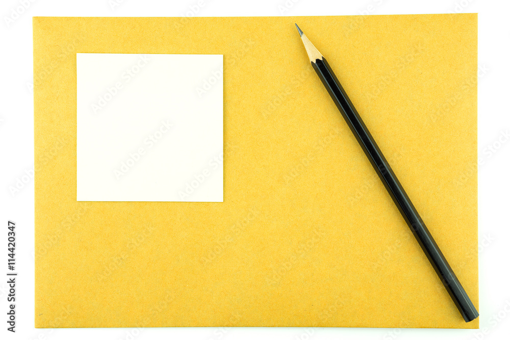 Pencil and note pad on envelope Pencil and note pad on envelope
