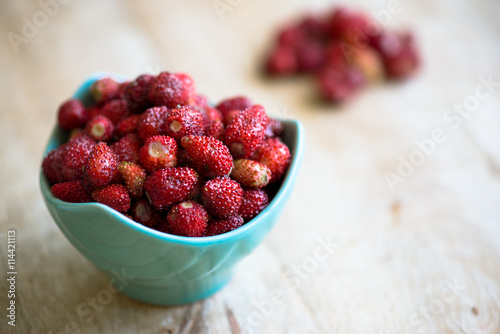 Wild strawberries in a bowl