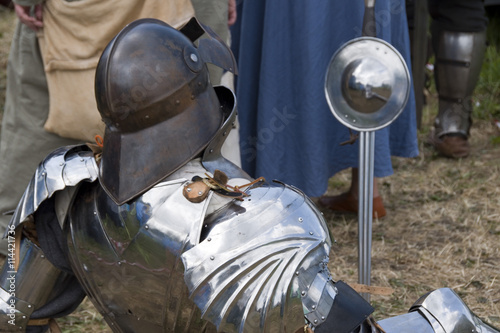 Tewkesbury, UK-July 17, 2015: Knight in armour from rear on 17 July 2015 at Tewkesbury Medieval Festival photo