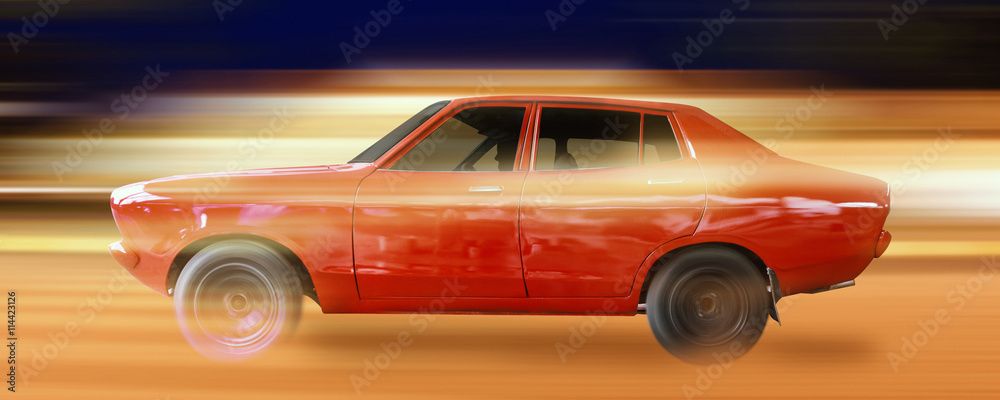 Red retro car, motion image,Driving a car fast